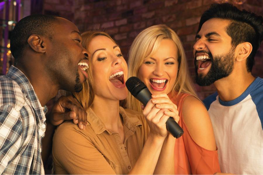 Sober karaoke date as couples sing together