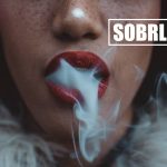Smoking woman shows the concept of when substance use or abuse becomes a form of self soothing