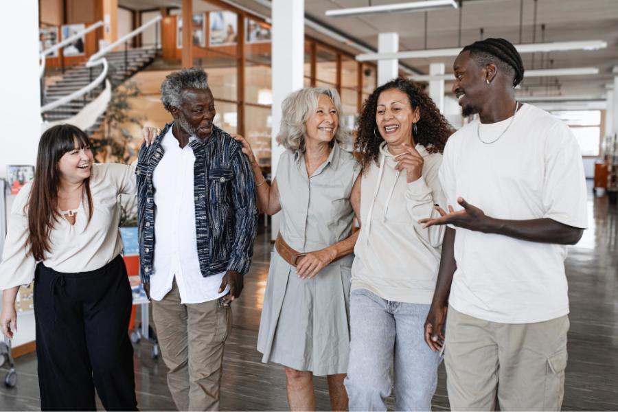 Recovery community organization board of directors meets while walking